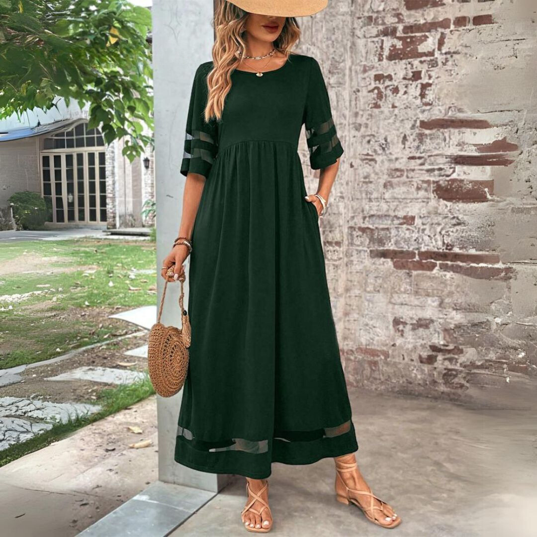 Green midi dress with gathered waist, sheer stripe sleeves, and sheer hem panel