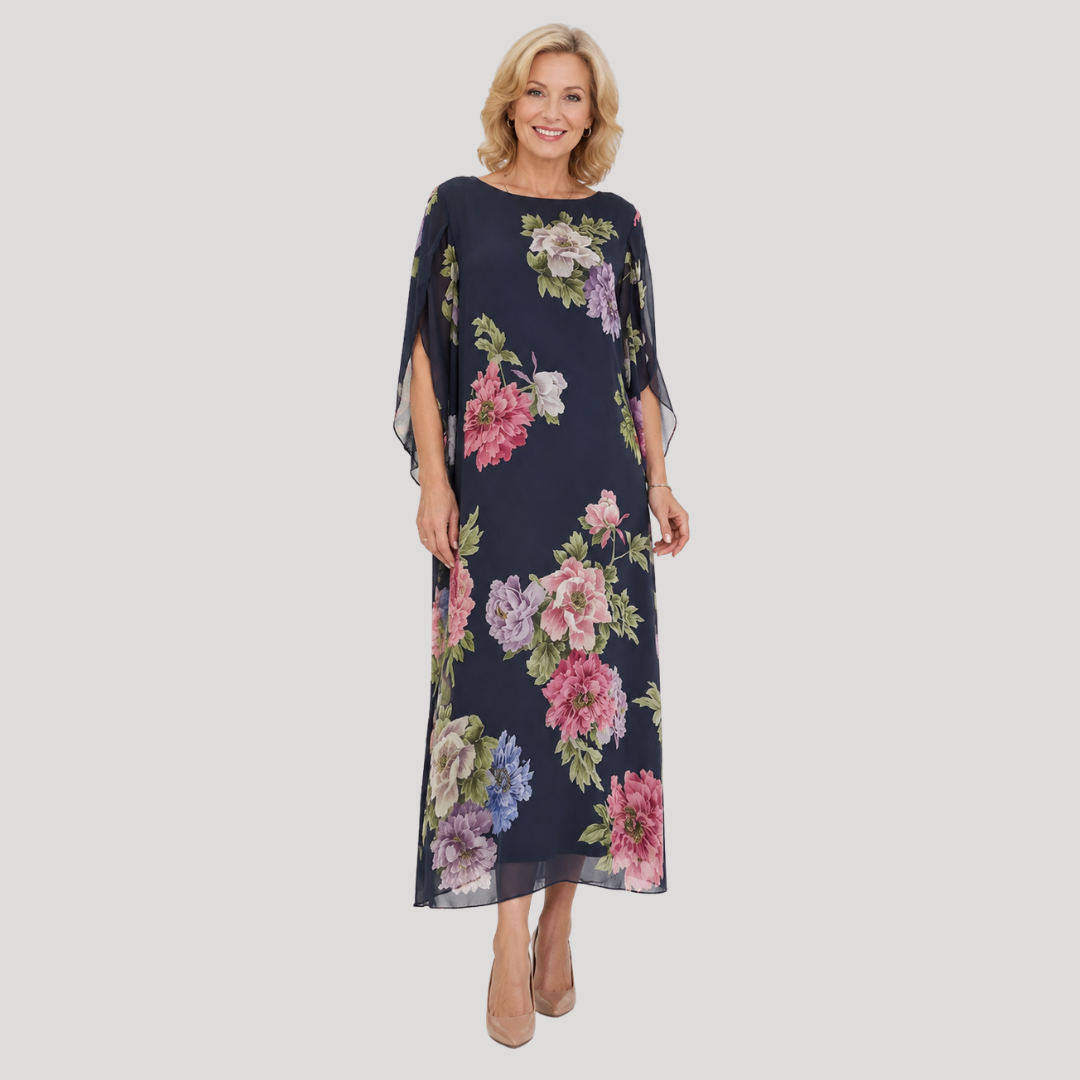 Midnight Bloom maxi dress in dark blue with large pink, lavender floral print, flowy sleeves