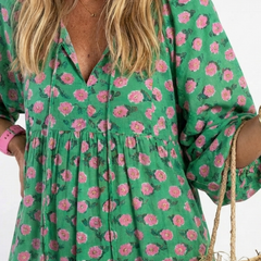Dark green floral print V-neck tiered midi dress with gathered waist and puff sleeves