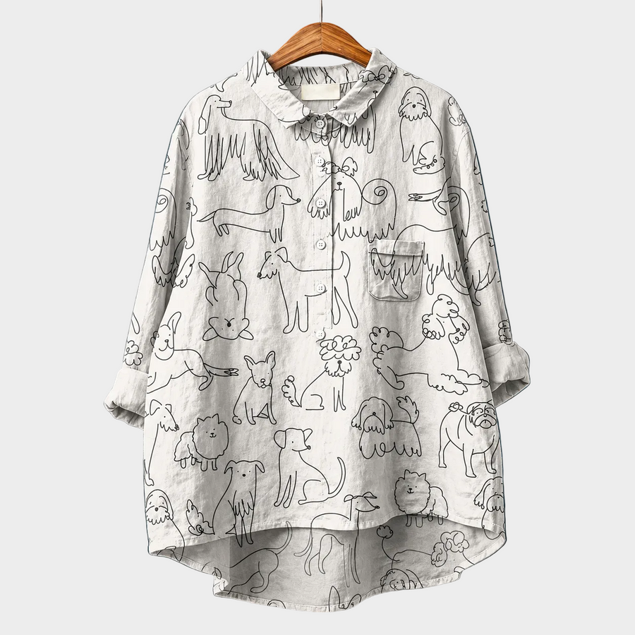 Blusa estiva bianca con stampa animali grigia, colletto arricciato e maniche lunghe