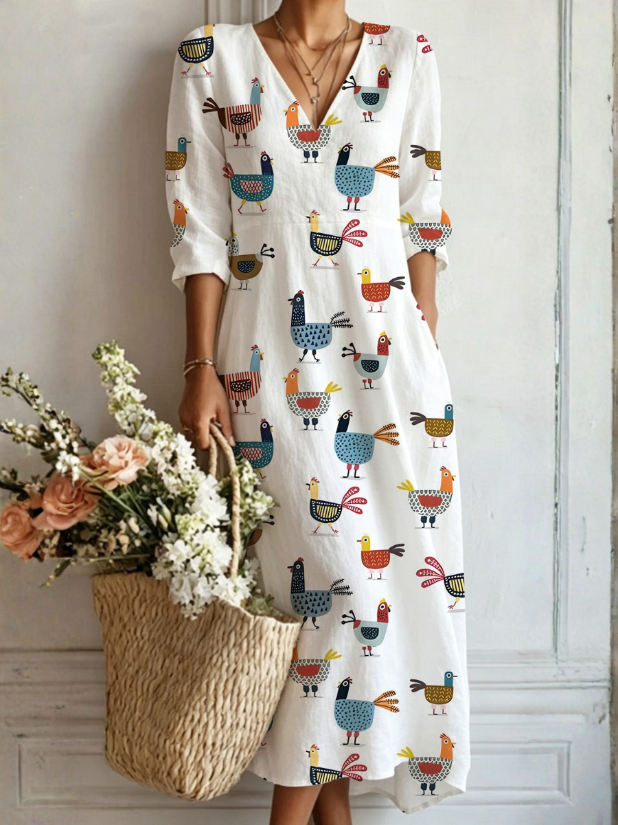 Abito da giorno bianco con motivo animali multicolore, scollo a V e maniche corte.