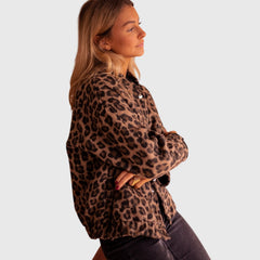 Leopard print jacket with button front, long sleeves, and side pockets