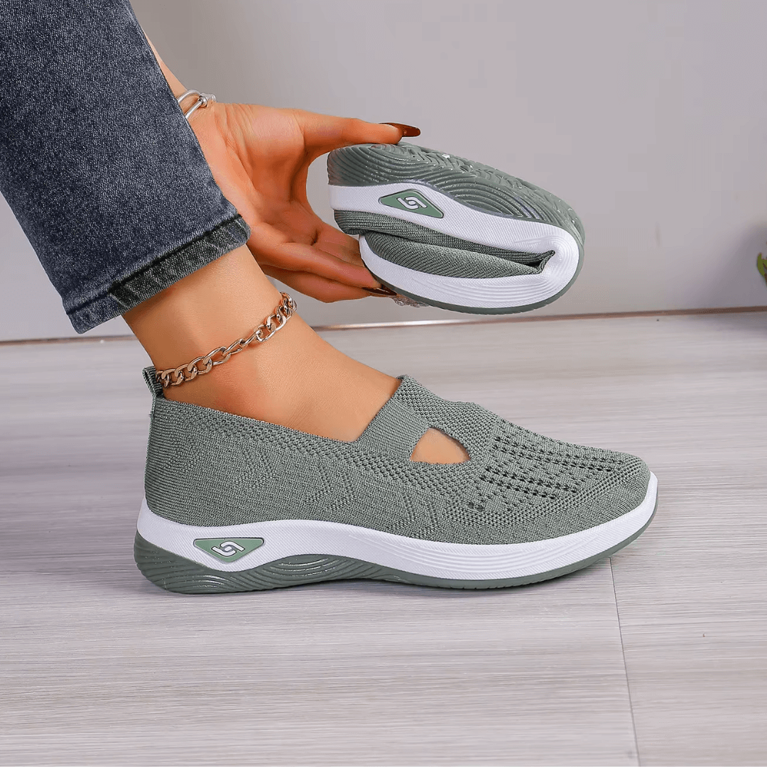 Scarpa antiscivolo ergonomica verde scuro con tomaia traspirante e suola bianca