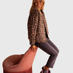 Leopard print jacket with button front, long sleeves, and front pockets