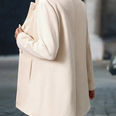 Cream classic elegant jacket shown from the back with button details