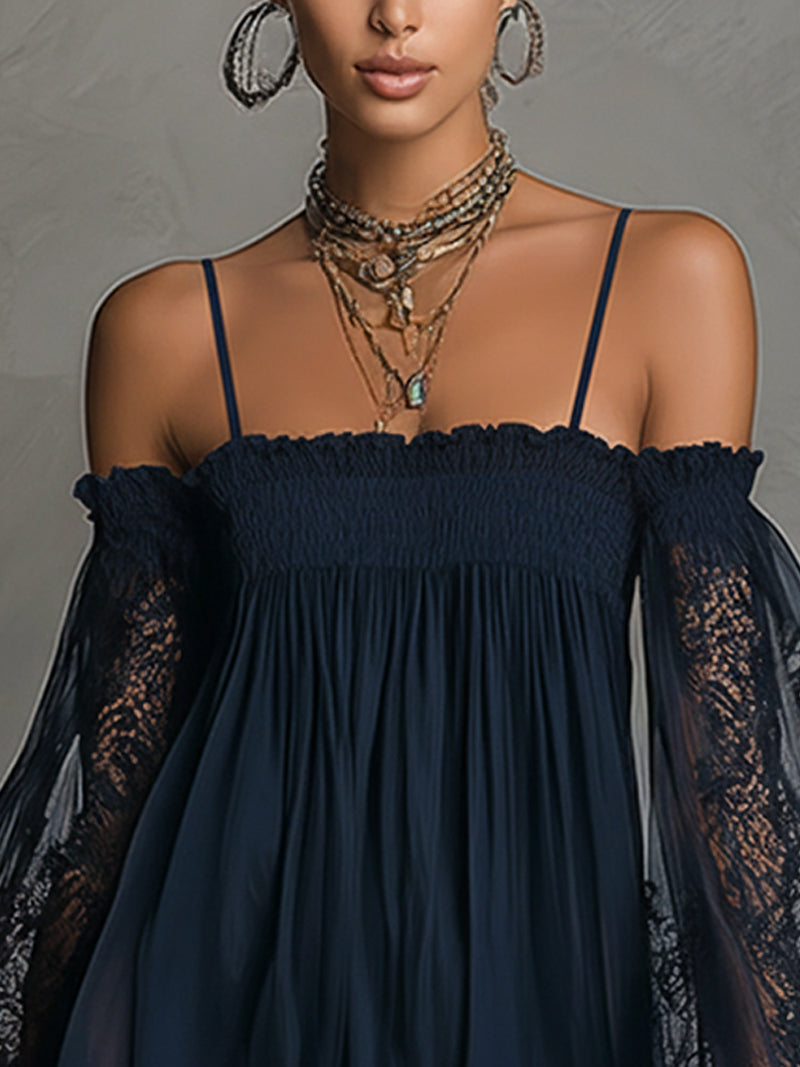 Navy off-shoulder mini dress close-up with smocked neckline and sheer lace sleeves