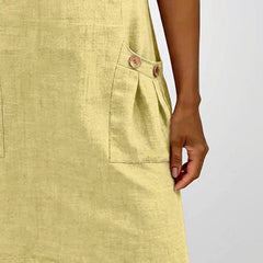 Abito in cotone verde chiaro con bottoni e chiusura a zip sul davanti