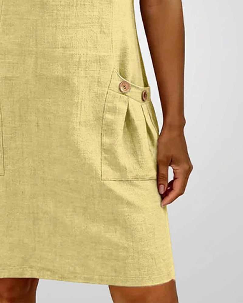 Abito in cotone verde chiaro con bottoni e chiusura a zip sul davanti