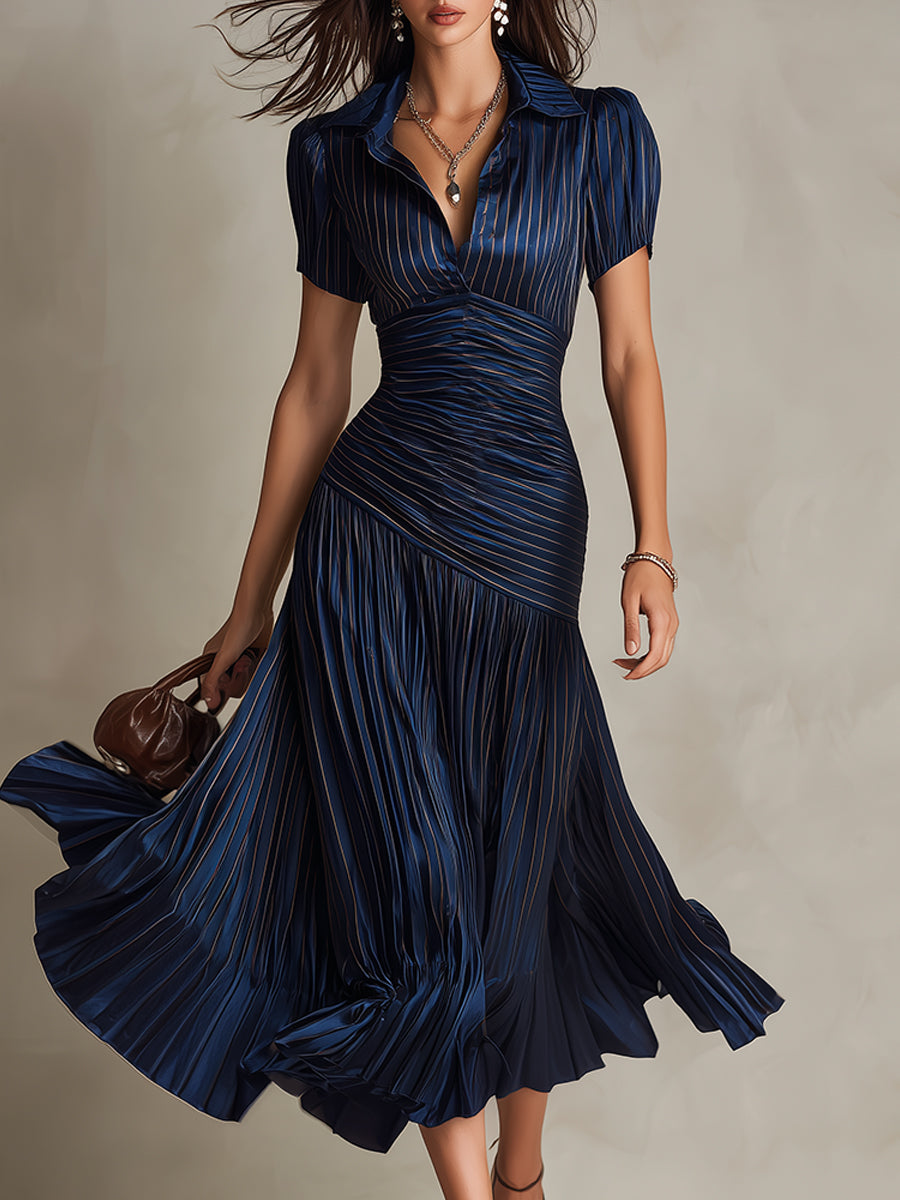 Dark blue striped satin midi dress with V-neck, ruched bodice, short sleeves, pleated skirt.