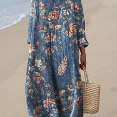 Boho maxi dress in blue with colorful floral print, V-neck and loose 3/4 sleeves