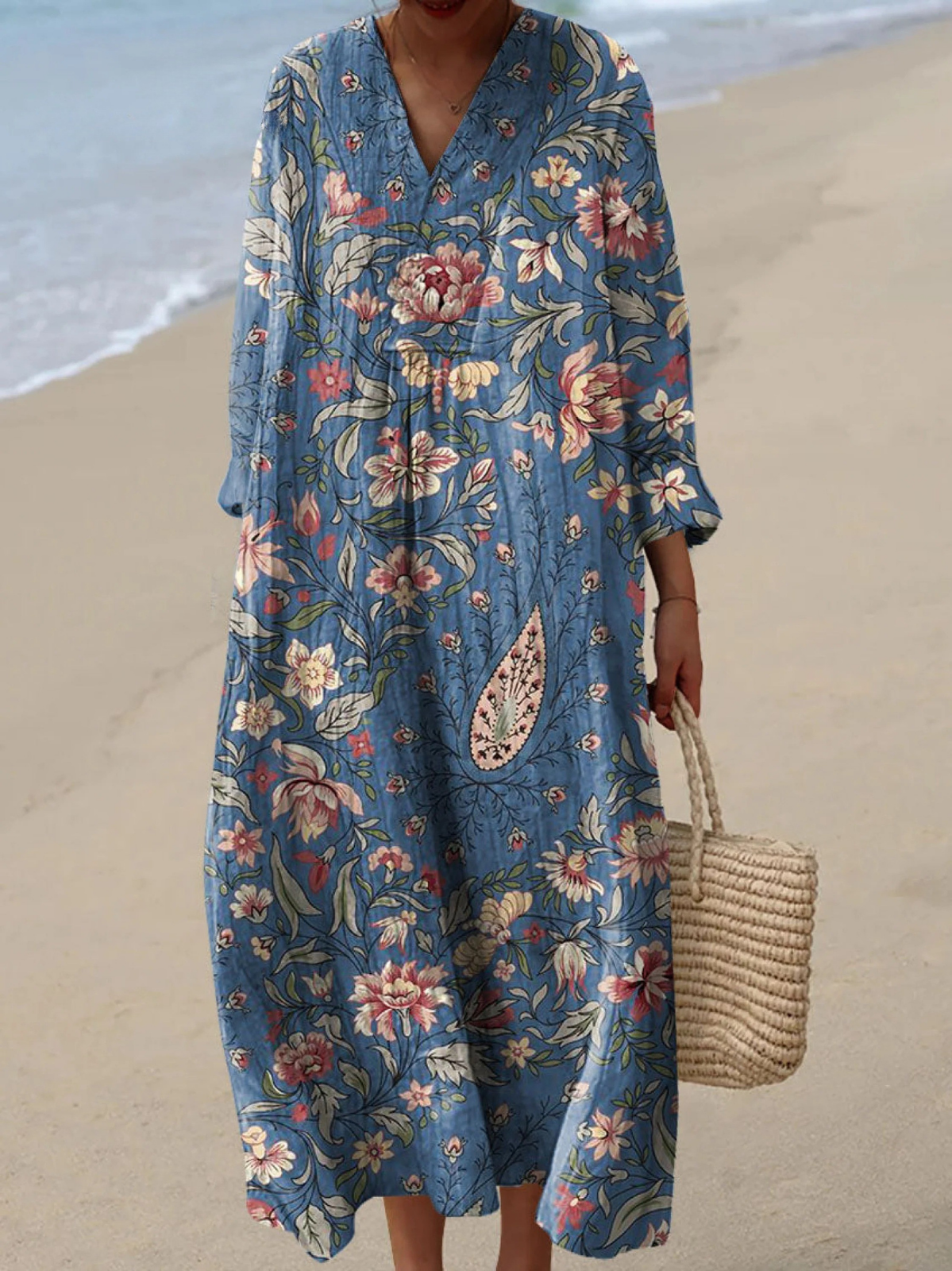 Boho maxi dress in blue with colorful floral print, V-neck and loose 3/4 sleeves