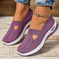 Purple knit slip-on shoes with side cutouts and white sole