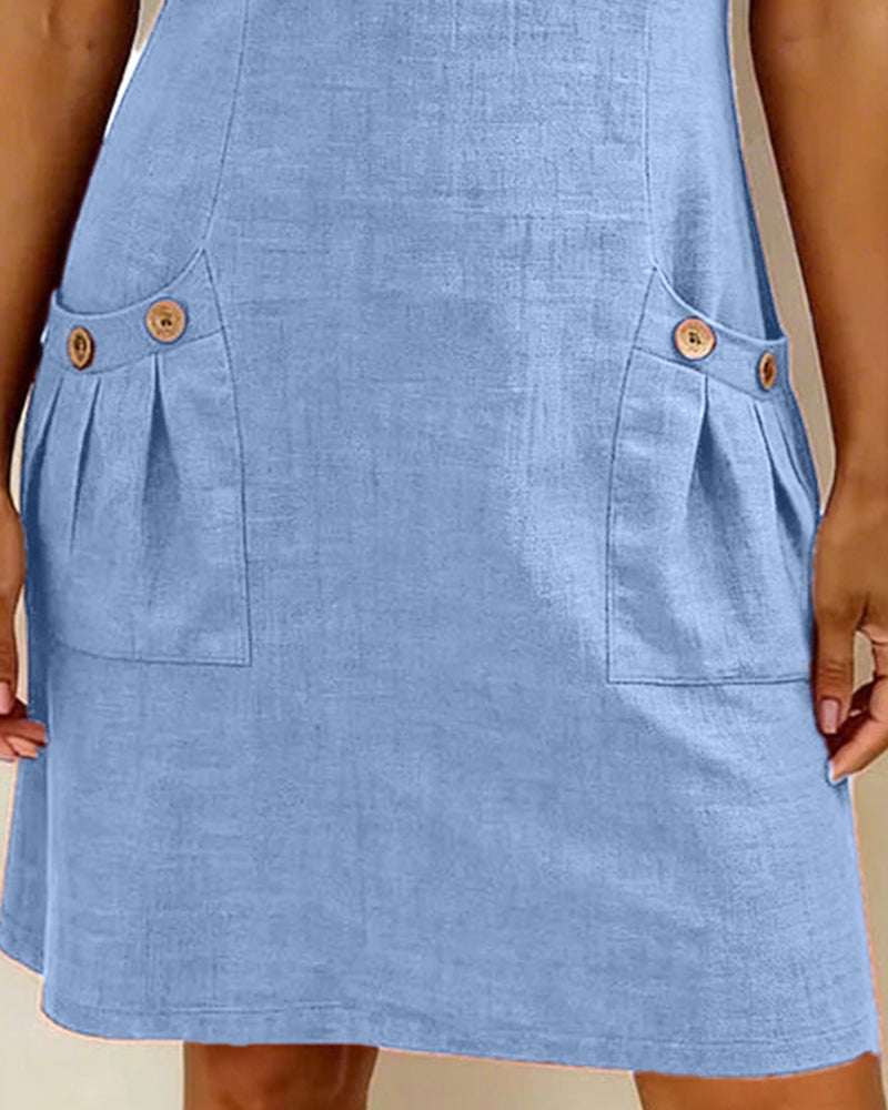 Abito in cotone azzurro: tasche laterali con bottoni e piega decorativa