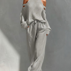Camilla fashionable set: gray sleeveless turtleneck knit with cold-shoulder and wide-leg pants