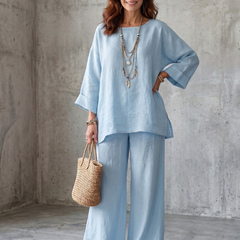 Light blue oversized tunic and wide-leg pants set with round neckline and bracelet cuffs