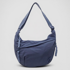 Borsa a tracolla blu in tessuto con zip laterale e tracolla regolabile