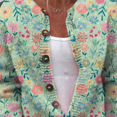Teal floral cardigan with V-neck and long sleeves, wooden-look button closure