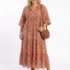 Geometric print V-neck tiered midi dress in orange and blue, 3/4 sleeves, full length