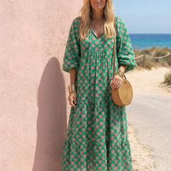 Dark green floral print V-neck tiered midi dress with 3/4 sleeves and gathered waist