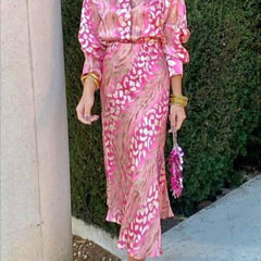 Pink and cream patterned long-sleeve midi dress with tie waist