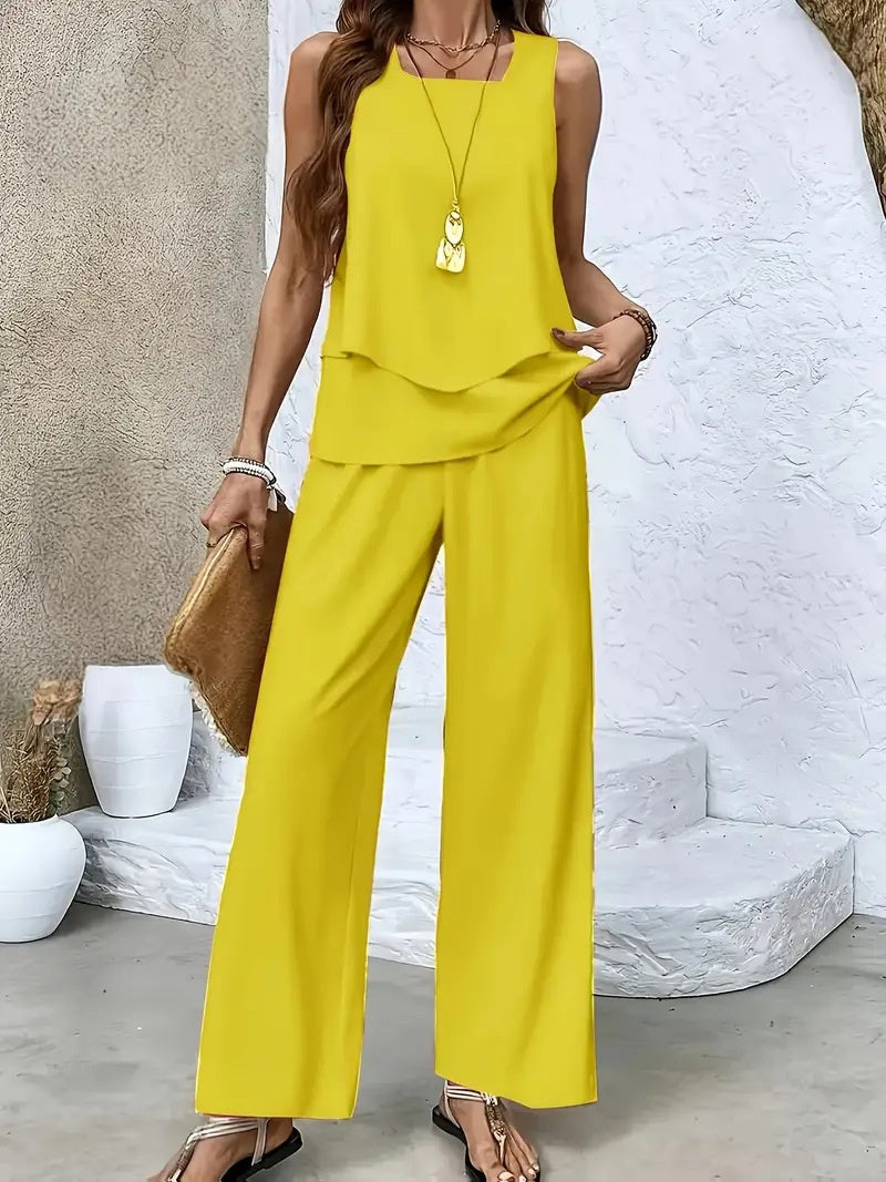 Completo due pezzi casual con top smanicato e pantaloni ampi gialli