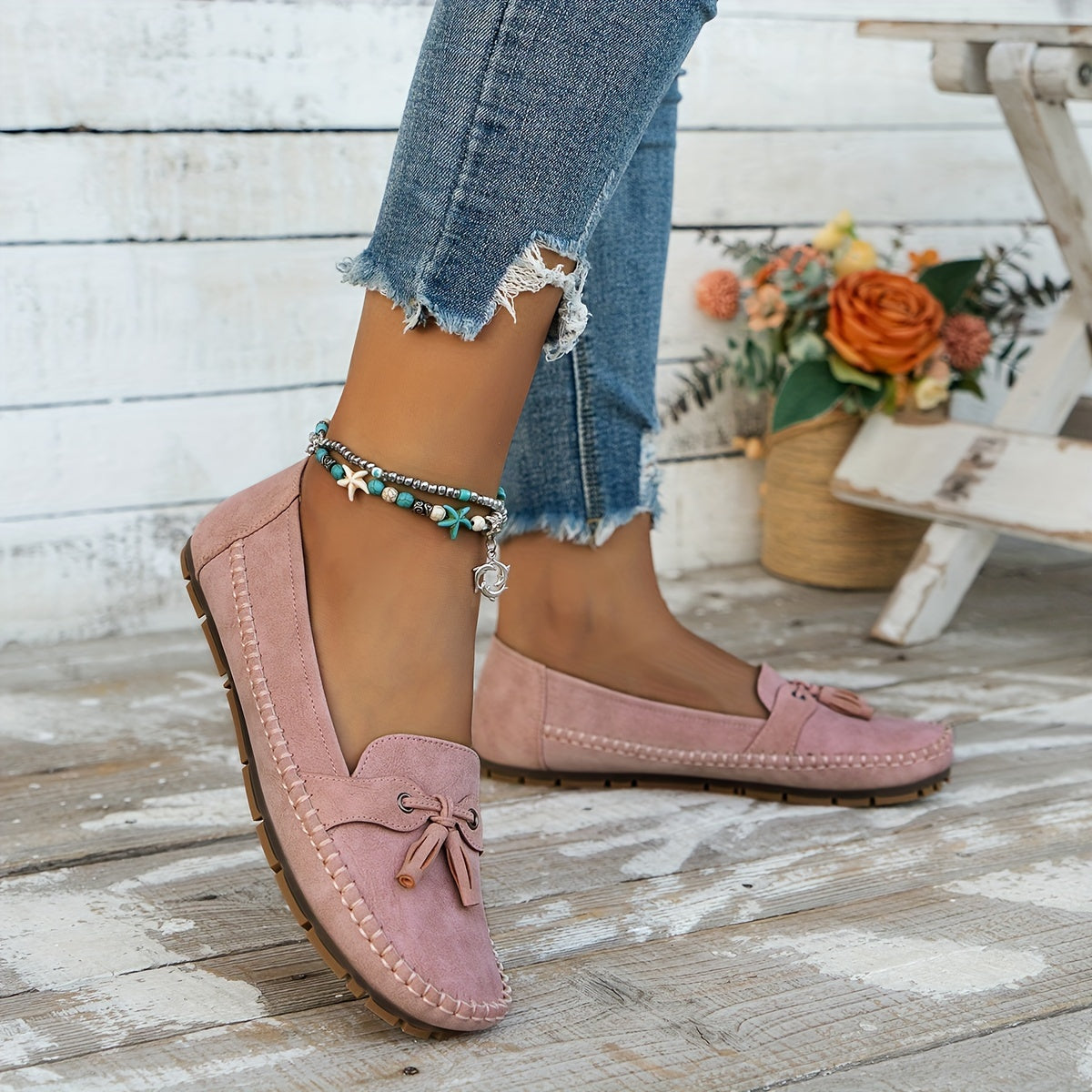 Mocassino ortopedico rosa con fiocco, suola antiscivolo e cuciture decorative