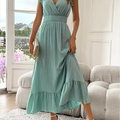 Abito midi verde chiaro con scollo a V, cintura arricciata e gonna a balze
