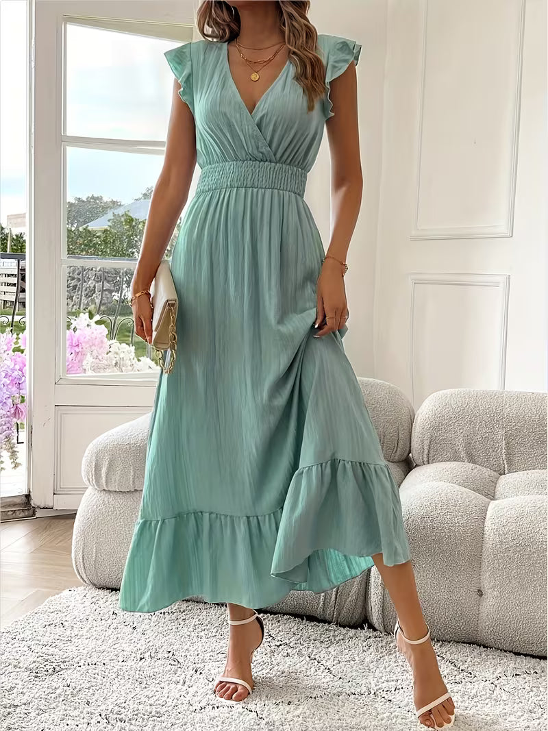 Abito midi verde chiaro con scollo a V, cintura arricciata e gonna a balze