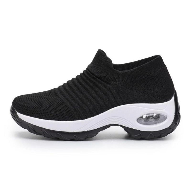 Scarpe ergonomiche antiscivolo nere a calza, suola robusta con insert ammortizzante