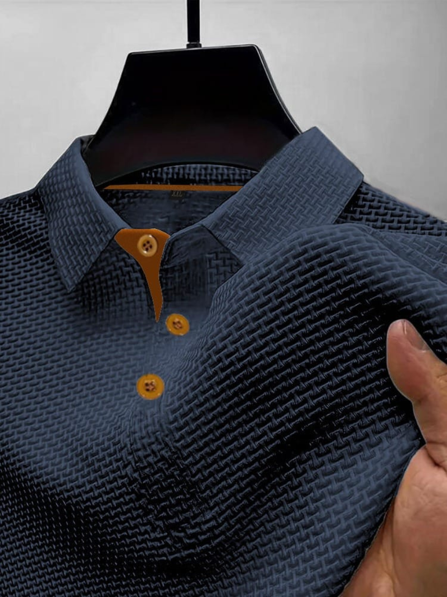Men's textured polo shirt, dark blue with tan buttons and short sleeves