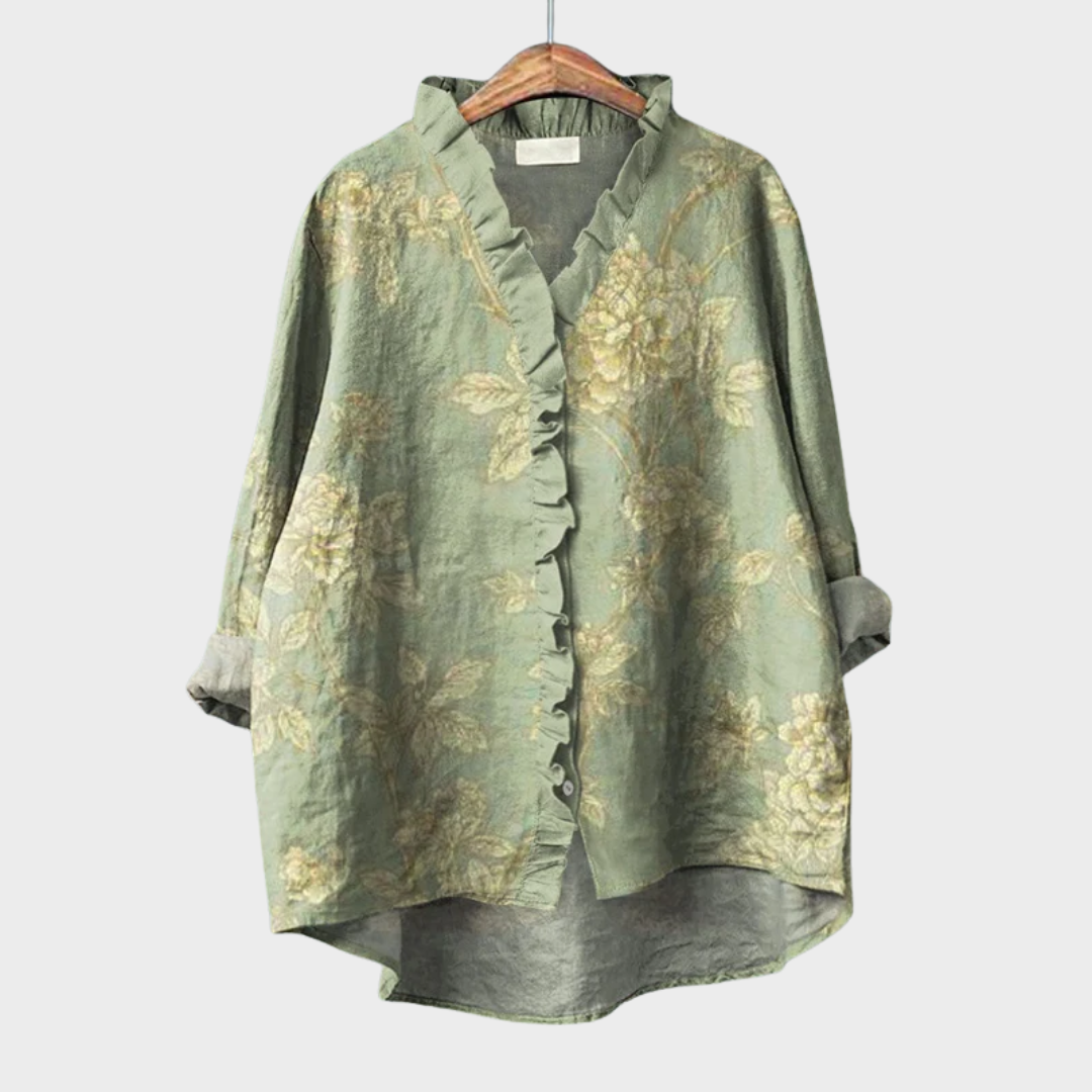Blusa estiva verde con stampa floreale, scollo a V con bottoni e volant frontali