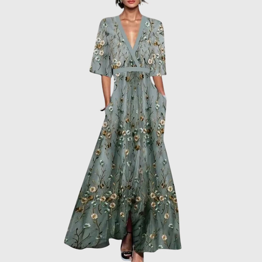 Green floral spring dress with V-neck, short sleeves, and waist tie belt