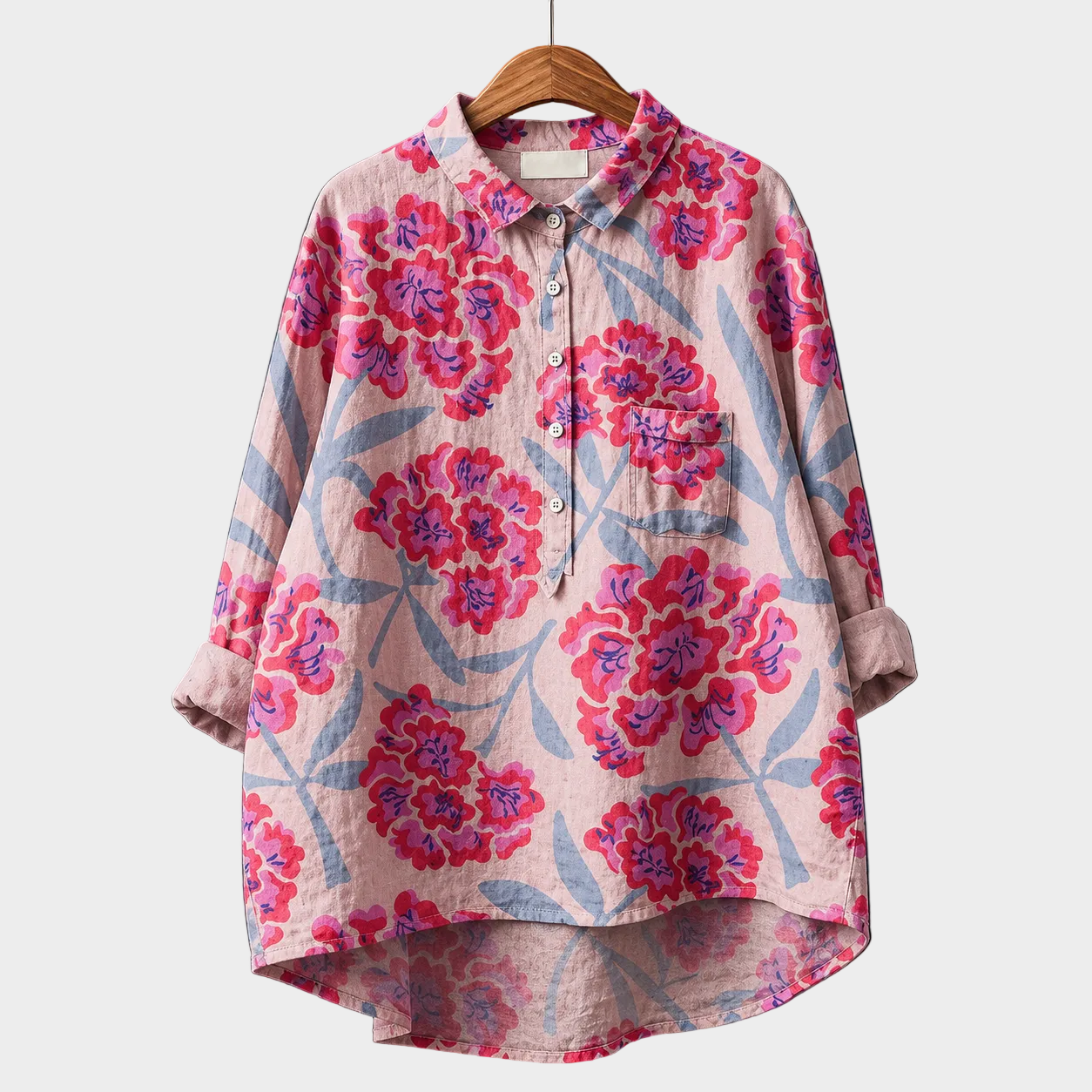 Blusa estiva con stampa floreale rosa e viola, bottoni frontali e colletto