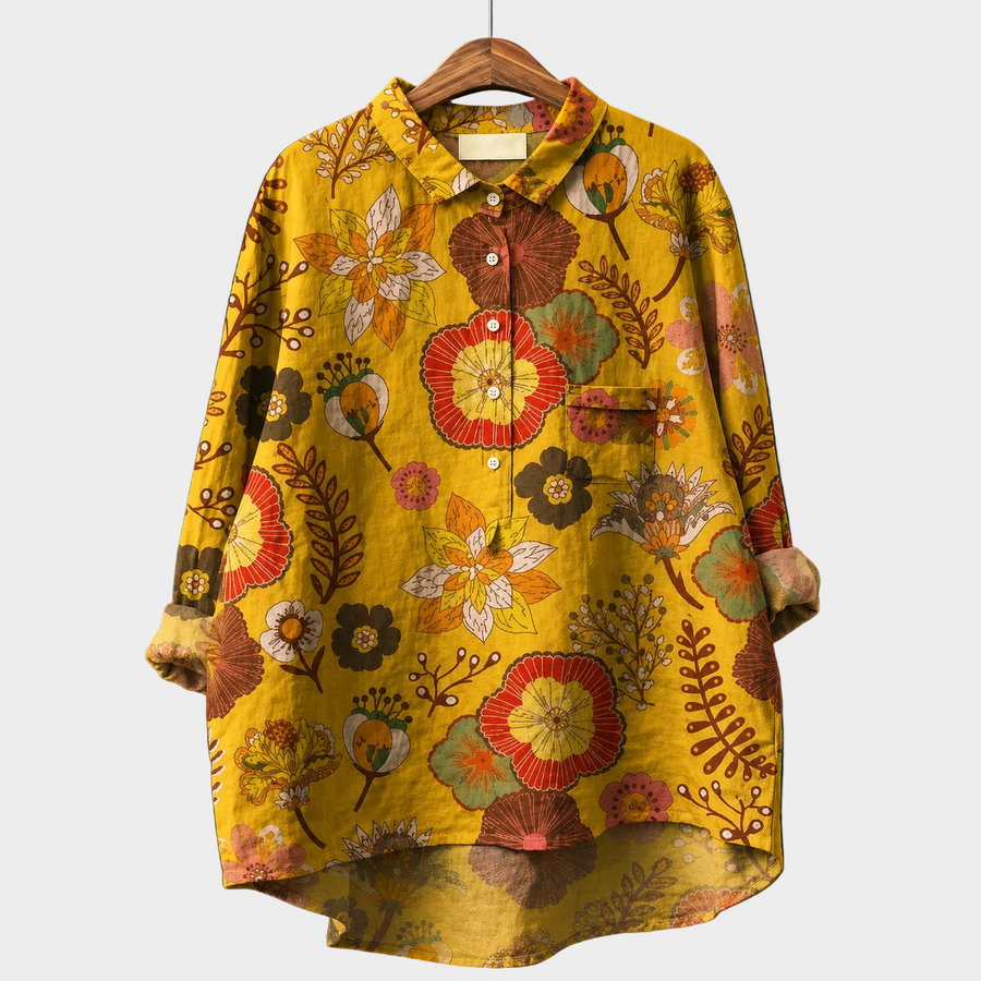 Blusa estiva gialla con stampa floreale multicolore, bottoni e colletto