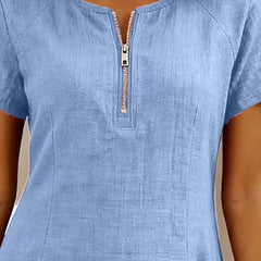 Abito in cotone azzurro: zip centrale frontale e maniche corte