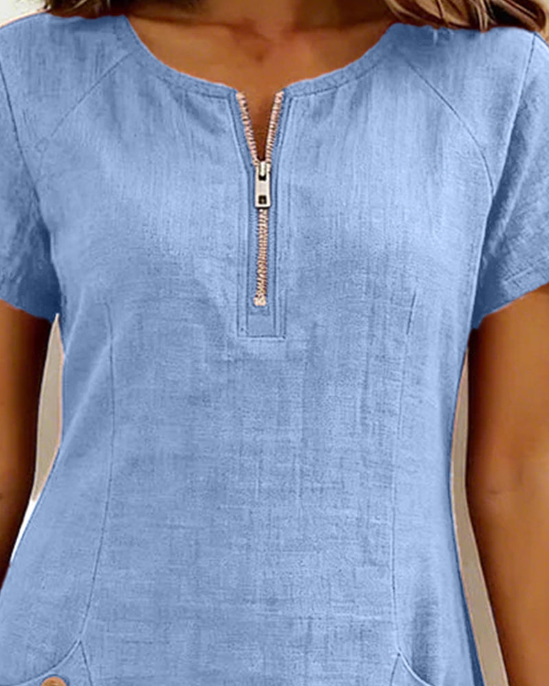 Abito in cotone azzurro: zip centrale frontale e maniche corte