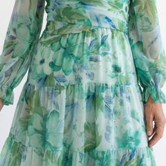 Althea long sleeve floral maxi dress close-up, teal-green tiered fabric and waist tie