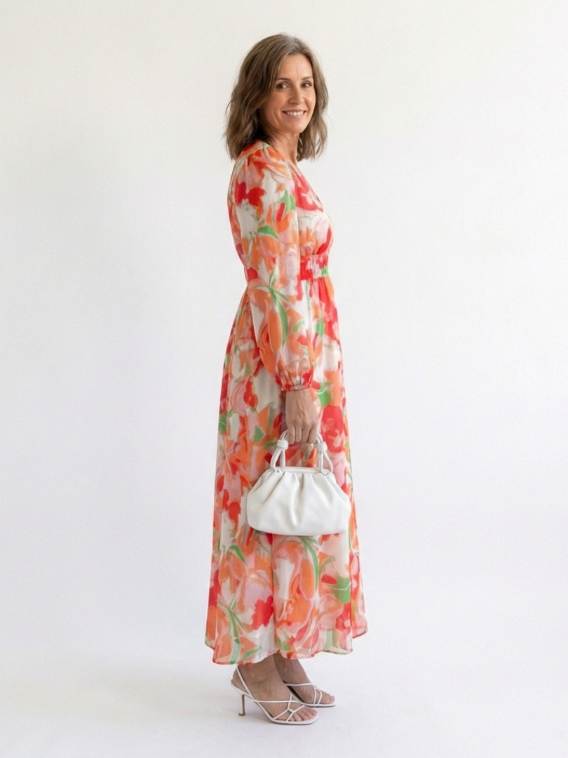 Long-sleeve floral maxi dress in coral and white with lightweight chiffon look