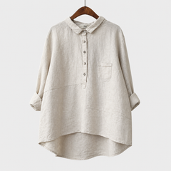 Blusa estiva in lino bianco con bottoni frontali, colletto e tasca sul petto