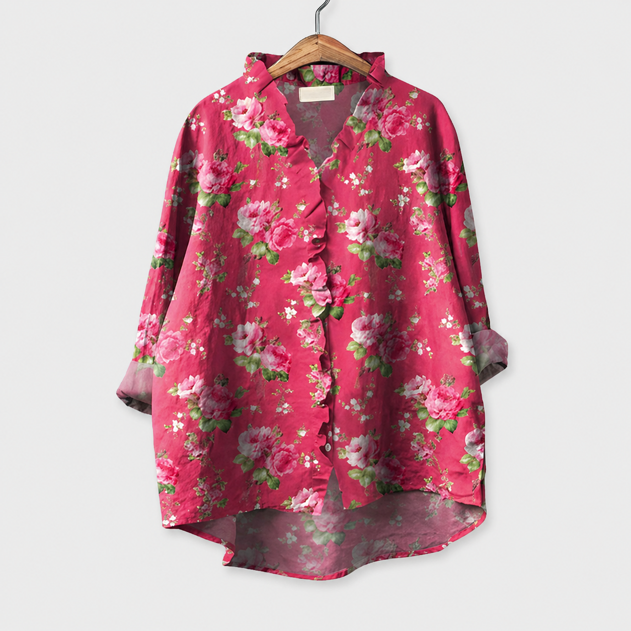 Blusa estiva rosa con scollo a V e maniche a tre quarti, motivo floreale