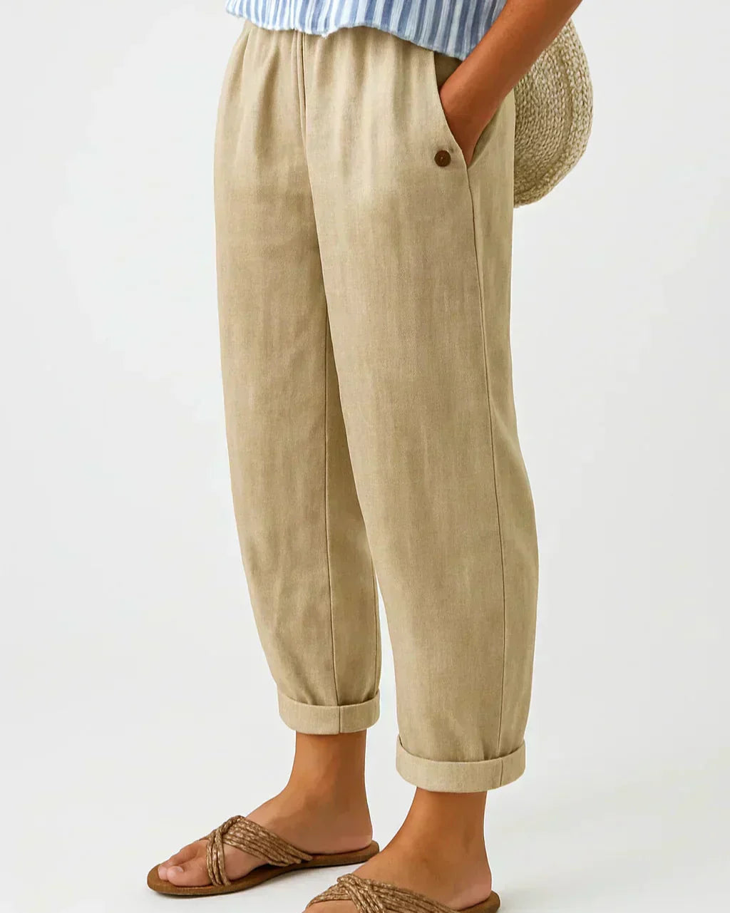 Beige linen-look cropped trousers with elastic waistband and button cuff hems