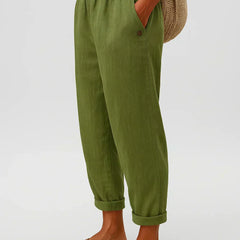 Olive green linen-look cropped trousers with elastic waistband and button cuff hems