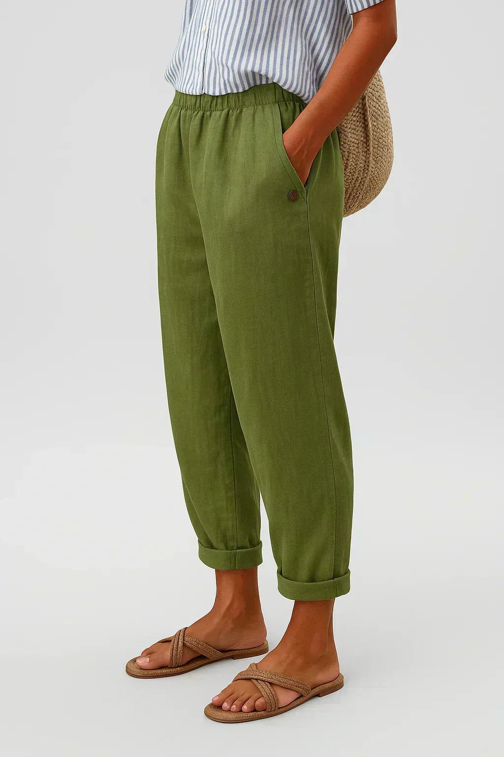 Olive green linen-look cropped trousers with elastic waistband and button cuff hems