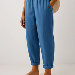 Blue linen-look cropped trousers with elastic waistband and button cuff hems