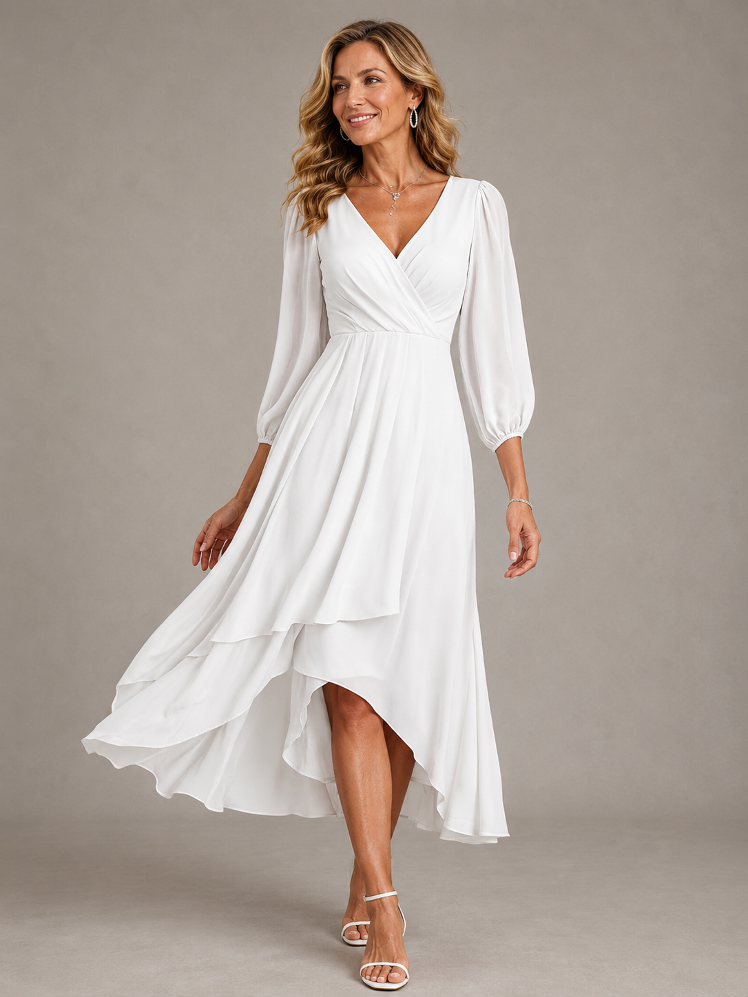 White V-neck long dress with puff sleeves and tiered asymmetrical hem