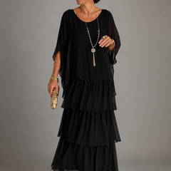 Black tiered maxi dress with loose dolman sleeves and scoop neckline, layered ruffle tiers
