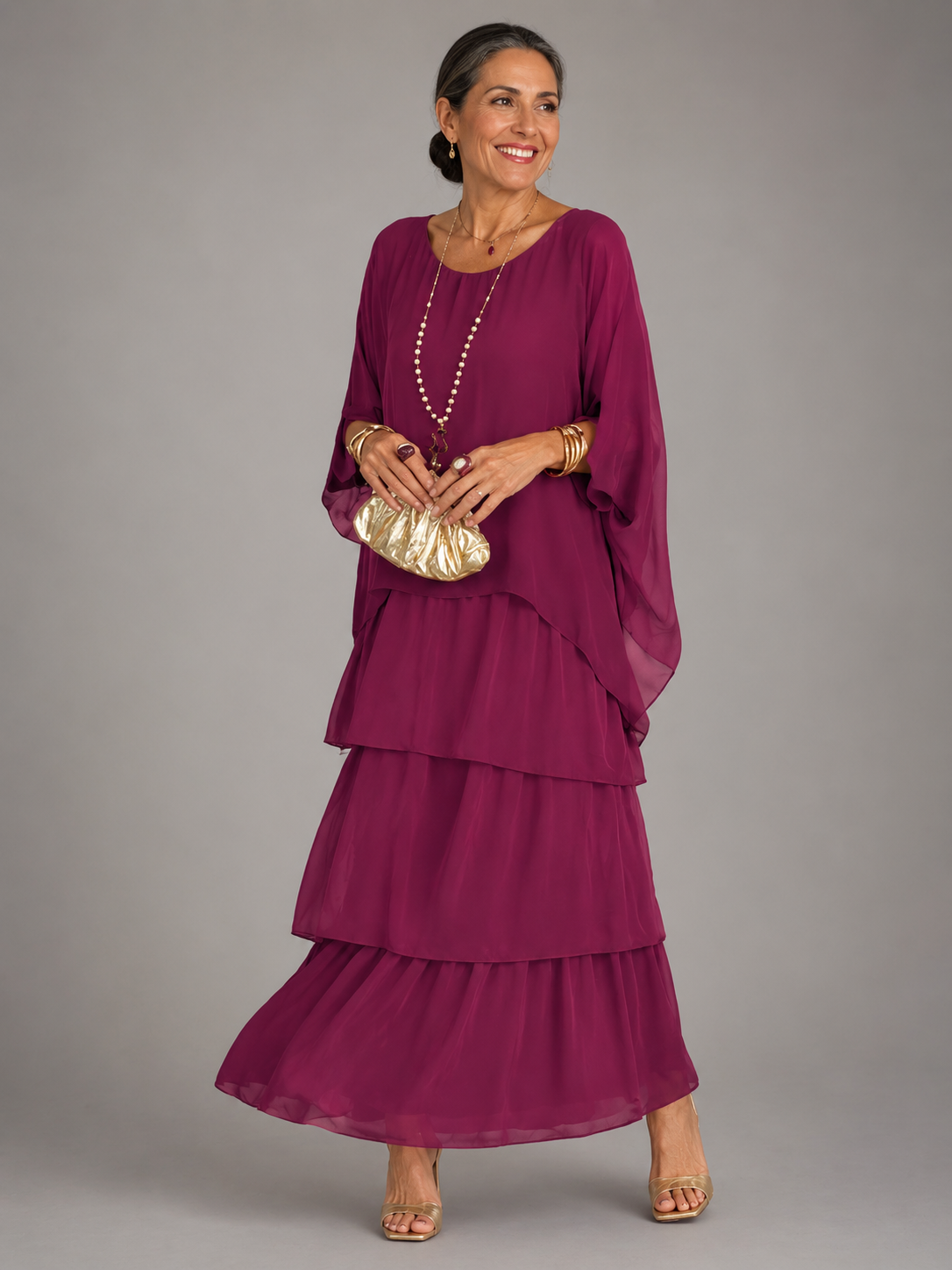 Berry purple tiered maxi dress with dolman sleeves and scoop neckline, flowing layered tiers