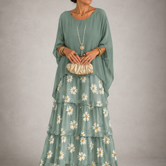 Sage green tiered maxi dress with floral print skirt, dolman sleeves and scoop neckline