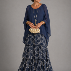 Dark blue tiered maxi dress with sheer sleeves and layered floral skirt
