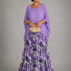Purple tiered maxi dress with sheer long sleeves and floral ruffle skirt